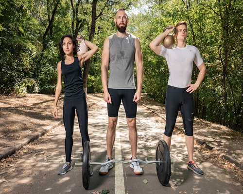 People using kettlebells during a functional training class